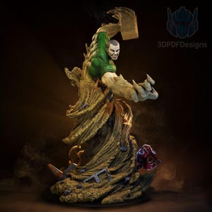 May include: A 3D-printed statue of a muscular figure with a green shirt and tan, sand-like arms and body. The figure is in a dynamic pose, with a determined expression. The base features debris and a red stop sign. The logo "3DPDFDesigns" is visible.