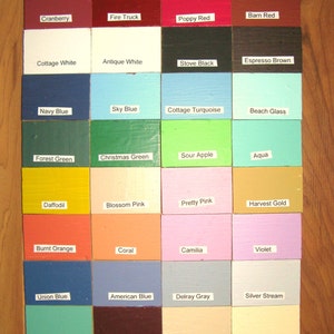 May include: A chart of 16 paint colors with their names, including Cranberry, Fire Truck, Poppy Red, Barn Red, Cottage White, Antique White, Stove Black, Espresso Brown, Navy Blue, Sky Blue, Cottage Turquoise, Beach Glass, Forest Green, Christmas Green, Sour Apple, Aqua, Daffodil, Blossom Pink, Pretty Pink, Harvest Gold, Burnt Orange, Coral, Camilia, Violet, Union Blue, American Blue, Delray Gray, Silver Stream, Jade Green, Burnt Sienna, Sand Castle, and Daylight Creme.