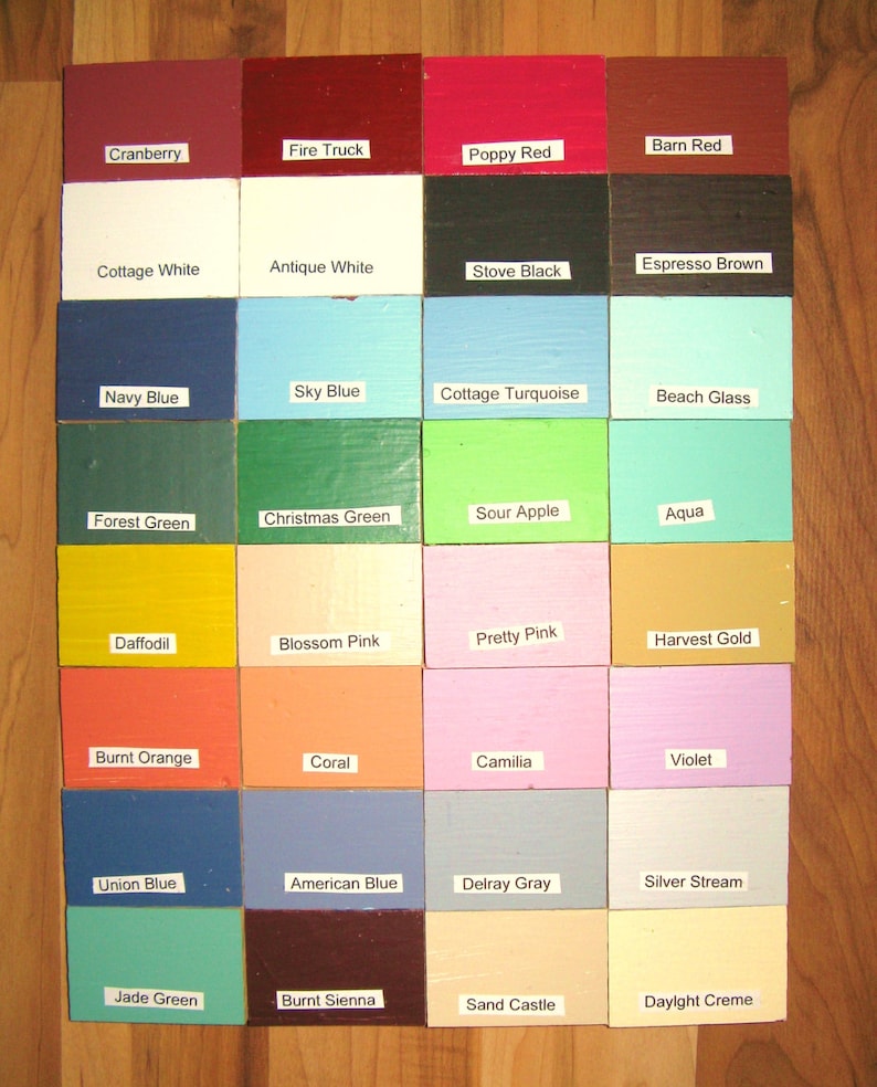 May include: A chart of 16 paint colors with their names, including Cranberry, Fire Truck, Poppy Red, Barn Red, Cottage White, Antique White, Stove Black, Espresso Brown, Navy Blue, Sky Blue, Cottage Turquoise, Beach Glass, Forest Green, Christmas Green, Sour Apple, Aqua, Daffodil, Blossom Pink, Pretty Pink, Harvest Gold, Burnt Orange, Coral, Camilia, Violet, Union Blue, American Blue, Delray Gray, Silver Stream, Jade Green, Burnt Sienna, Sand Castle, and Daylight Creme.