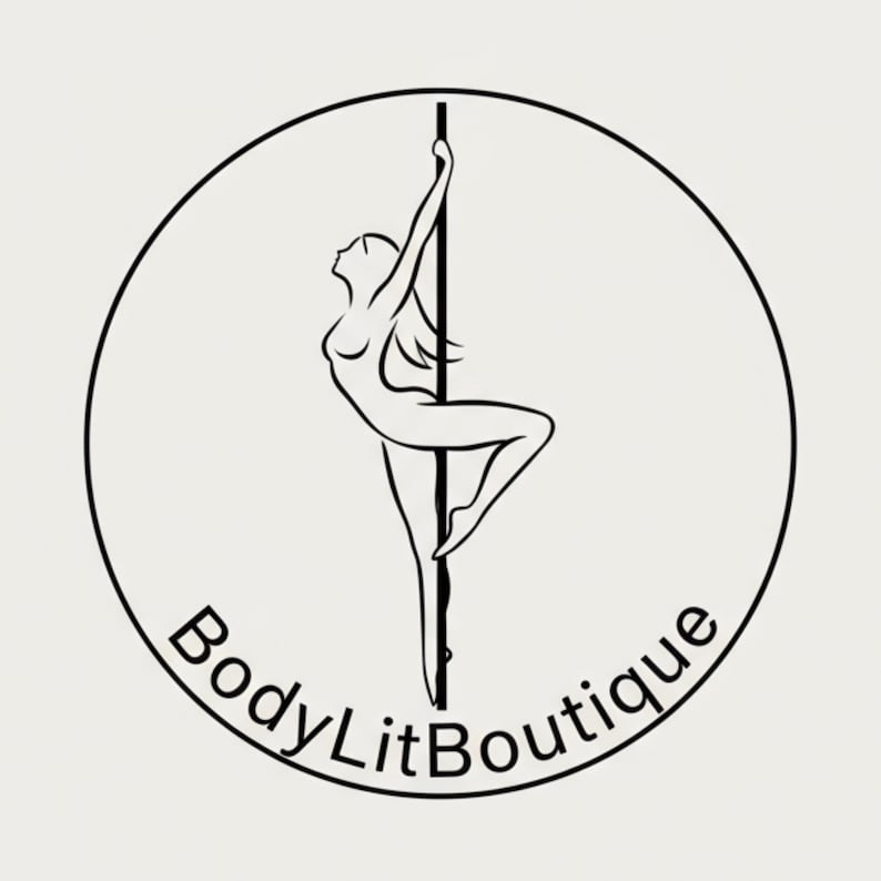 May include: A circular black and white logo featuring a stylized line drawing of a person performing a pole dance move. The text BodyLitBoutique is written in a black sans-serif font along the bottom curve of the circle, centered below the figure.