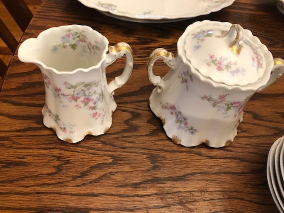 Haviland Limoges 93-piece Pink & Blue Flowered Porcelain Haviland Limoges 93-piece Pink & Blue Flowered Porcelain