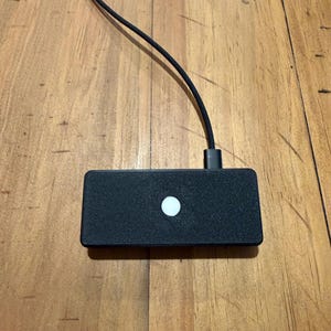 3D printed Wired Touch ID enclosure in black for usb-c cable (not included)