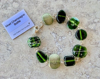 Stunning green recycled glass bead bracelet. Handmade glass beads from a champagne bottle. Recycled, upcycled, repurposed jewellery