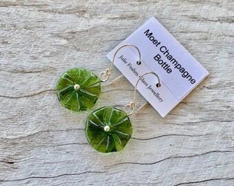 Green recycled glass flower earrings. Glass floral earrings, beads made from a champagne bottle. Great colour, sterling silver findings