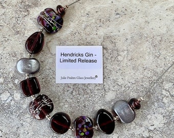 Gin bottle necklace. Handmade recycled glass beads made from a Hendricks Gin (Limited Release) bottle