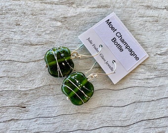 Green sparkly earrings. Handmade recycled glass beads from a champagne bottle. Great colour, a touch of sparkle, perfect for day or night.