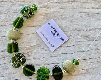 Stunning green recycled glass necklace. Beads made from a champagne bottle. Repurposed, statement necklace