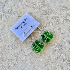 Green recycled glass earrings. Sparkly earrings handcrafted from a Tanqueray Gin Bottle. Sterling Silver findings.