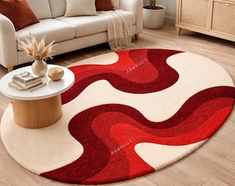 Modern abstract ovaal rood en crème getuft wollen vloerkleed zacht artistiek statement vloerkleed woonkamer