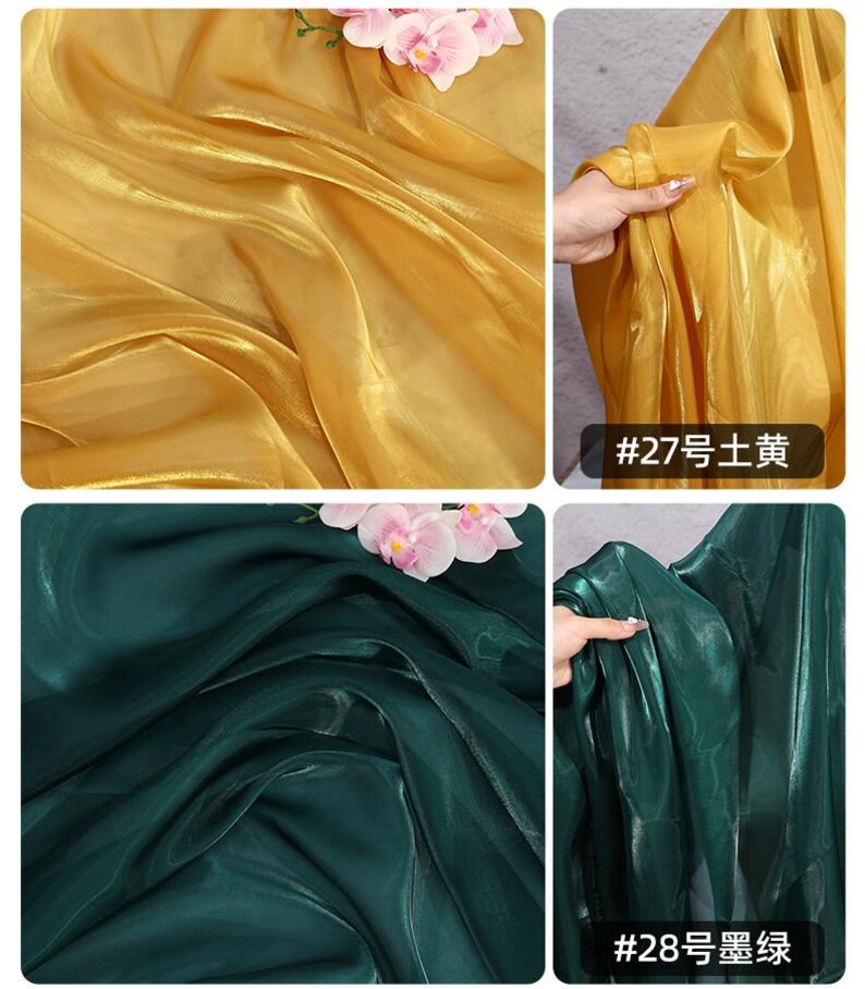 May include: Close-up of two sections of fabric, one gold and one dark green, with soft folds and a slight sheen. The gold fabric has a floral accent. The dark green fabric has the text "#28" and Chinese characters. The gold fabric has the text "#27" and Chinese characters.