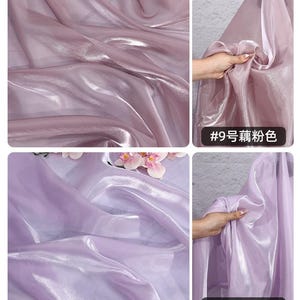 May include: Close-up of shimmering, sheer fabric in shades of lavender and pink. The fabric has a glossy finish, with light reflecting off the folds. The text in the image reads "#9" and "#10".