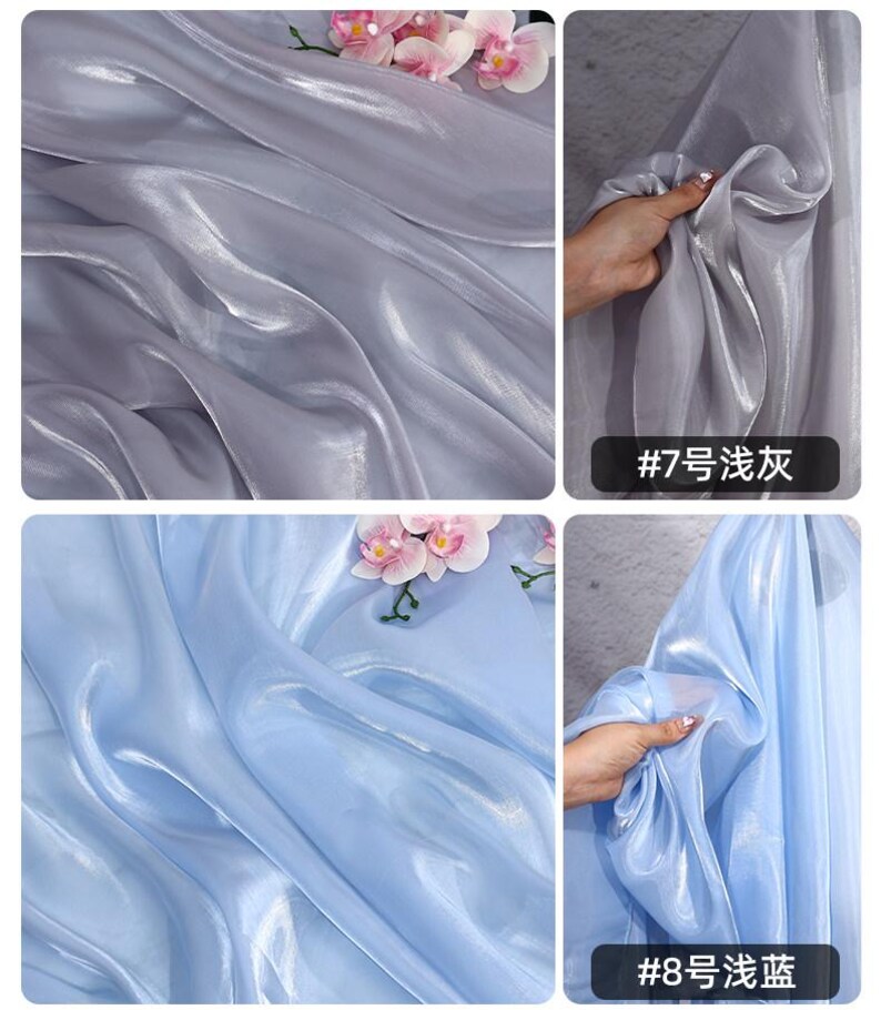 May include: Close-up of two sections of sheer fabric, one in a light gray and the other in a light blue. Both fabrics have a glossy sheen and are draped in soft folds. Pink and white flowers are placed on top of the gray fabric. The text "#7" and "#8" are visible.