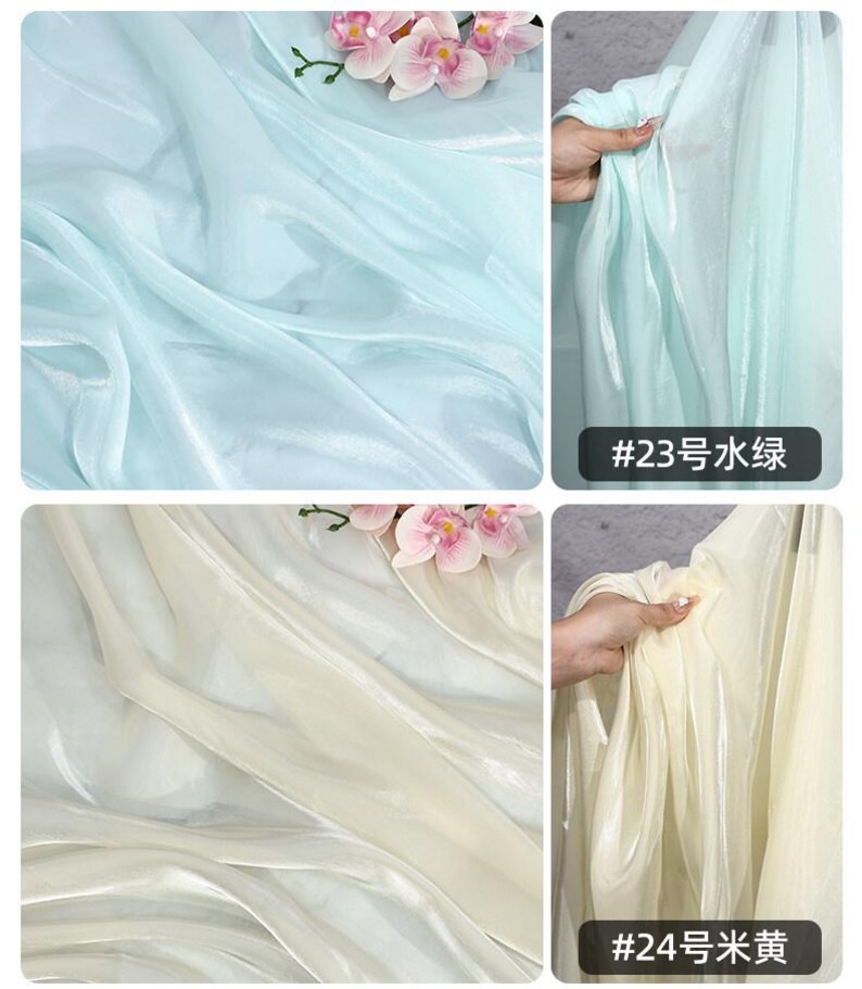 May include: A collage of sheer fabric samples in shades of light blue and cream, with a glossy finish. The fabric is draped and folded, with a sprig of pink flowers in the background. The text "#23" and "#24" is visible.