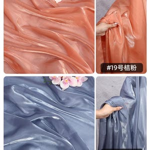 May include: Close-up shots of shimmering fabric in two colors. One is a soft peach, the other a muted blue-gray. The peach fabric is labeled "#19", and the blue-gray is labeled "#20". Both fabrics have a glossy sheen, and are draped to show their texture.