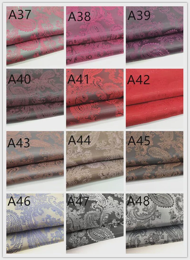 May include: A grid of nine fabric swatches, each displaying a different color and pattern. The fabrics feature a paisley design in shades of red, burgundy, brown, and gray. Each swatch is labeled with a number, ranging from A37 to A48.