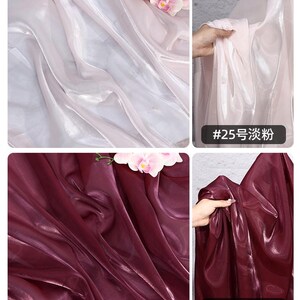 May include: Four images showcasing sheer fabric in two colors. The top two images display a light pink fabric, while the bottom two show a deep burgundy fabric. The fabric is draped and folded, with a glossy sheen. The text "#25" and "#26" are visible.