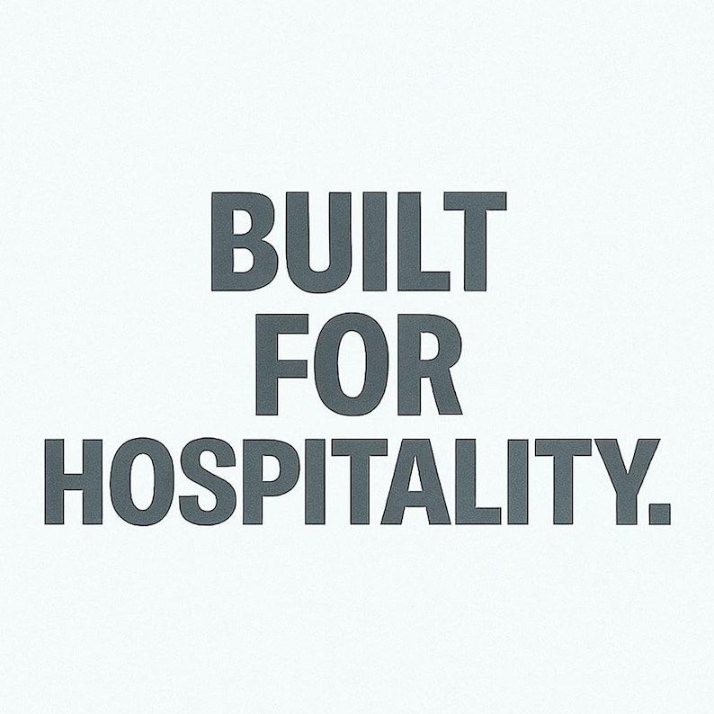 Może przedstawiać: Na białym tle tekst "BUILT FOR HOSPITALITY" w ciemnoszarej, bezszeryfowej czcionce. Tekst jest wyśrodkowany i zajmuje większość obrazu.