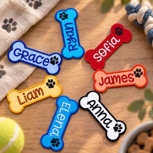 May include: Seven bone-shaped embroidered patches in various colors including blue, light blue, red, orange, yellow, and white. Each patch features a name stitched in a script font and a small black paw print icon. The names are Ryan, Sofia, Grace, James, Liam, Elena, and Anna.