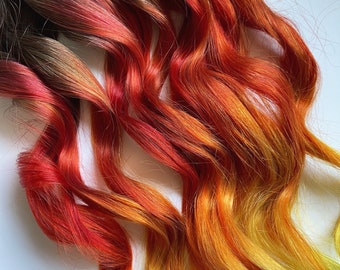 Muted fire hair extensions, fall copper hair clips, red orange and yellow human hair, tapes, wefts, cowboy copper balayage, burning man