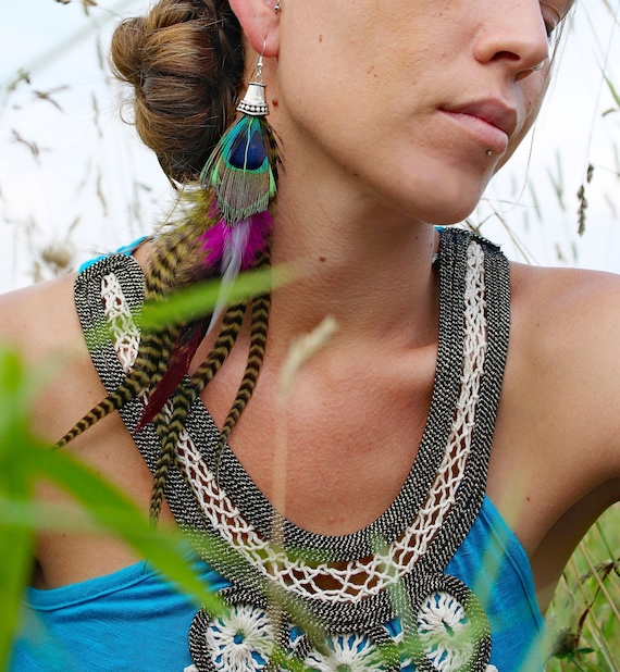 Single feather earring deals