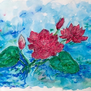 May include: Watercolor painting of a water lily scene. The artwork features vibrant red flowers, green lily pads, and buds against a backdrop of blue water and sky. The painting has a soft, artistic style.