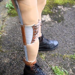 Extraordinary vintage 1960s rare womens stiff lightweight metal leather KAFO polio leg brace steampunk