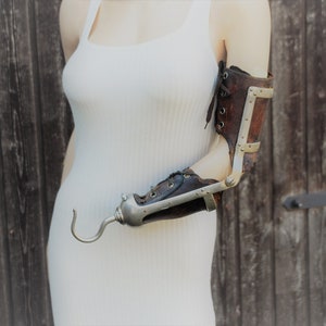 Very rare vintage womens prosthetic arm amputee with work hook attachment  steampunk
