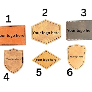 May include: Six leather patches in different shapes, including rectangular, hexagonal, and shield designs. Each patch has the text "Your logo here" printed on it, ideal for custom branding or labelling products. The patches are in shades of brown and grey.