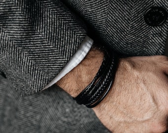 Herrflätat svart läderarmband med magnetlås Herrsmycken