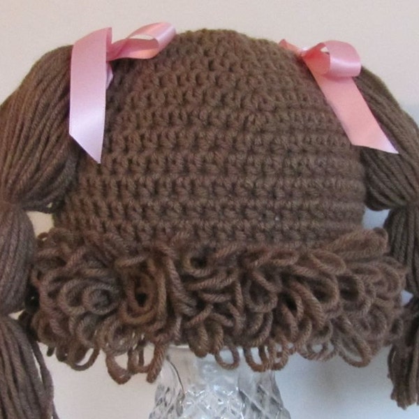 Cafe brown  Cabbage patch wig/hat toddler 2 - 4 yr.  You choose bow color