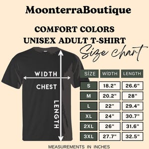 May include: A black t-shirt size chart from MoonterraBoutique. The graphic shows a black t-shirt with white arrows indicating width and length. A table lists sizes S through 3XL with corresponding width and length measurements in inches.