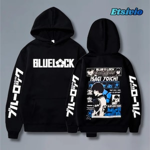 May include: Black hoodie with the text "BLUELOCK" in white on the front and Japanese text on the sleeves. The back features a graphic of a character with the text "ISAGI YOICHI".