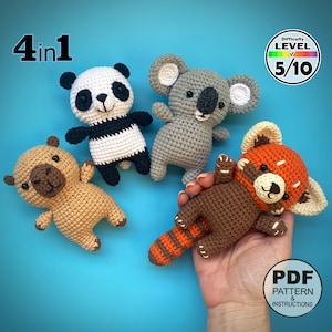 May include: A white ceramic mug with a black handle and the text "But First, Coffee" in a black, handwritten-style font. The mug is on a white surface.