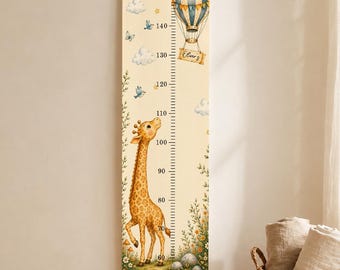 May include: A vertical wall-hanging growth chart featuring a cream background with a giraffe, a hot air balloon, clouds, and flowers. The chart includes a printed scale from 60 to 160 centimeters and a banner with the name Oliver written in script.