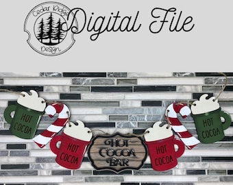May include: A wooden hot cocoa bar banner with red and green mugs, candy canes, and the text "Hot Cocoa Bar".