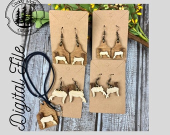 May include: Three pairs of wooden earrings featuring a brown and white sheep silhouette. A matching necklace with a brown and white sheep silhouette pendant is also included. The earrings and necklace are displayed on brown card stock.