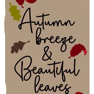 May include: A brown wooden sign with the text "Autumn breeze & beautiful leaves" in black cursive font. The sign is decorated with red and green leaves.