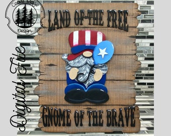 May include: Wooden sign with a patriotic gnome holding a blue balloon with a white star. The sign reads "Land of the Free Gnome of the Brave".