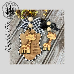 May include: Wooden cutout of a giraffe with the text "You pet your giraffe I will!" on a wooden background with black and white checkered trim.