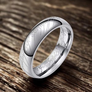 以下が含まれることがあります： 遊び心のあるフォントで「Welcome」と書かれた手作りの木製サイン。 白く塗装され、使い古したような仕上がりで、小さな装飾的なハートが付いています。 幅は約30cmです。