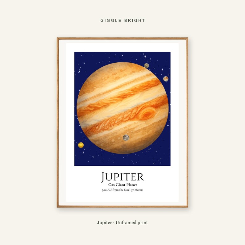 May include: A framed wall print featuring a large illustration of the planet Jupiter against a dark blue starry background. The text reads GIGGLE BRIGHT, JUPITER, Gas Giant Planet, 5.20 AU from the Sun | 97 Moons, and Jupiter - Unframed print.