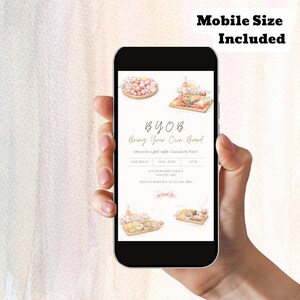 May include: A smartphone displays a BYOB invitation for a girls night charcuterie party. The invitation features watercolor illustrations of food platters and text. The phone is held by a person.