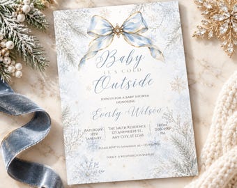 Invitation pour une fête prénatale garçon sur le thème « Bébé, il fait froid dehors », motif flocons de neige et paysage hivernal bleu.