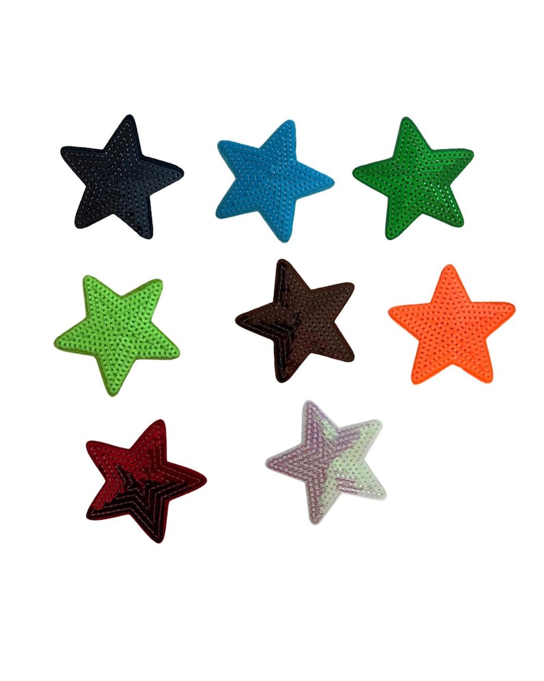 May include: Nine star-shaped patches in a variety of colours: navy, teal, green, lime green, brown, orange, burgundy, and a light purple and green mix. Each patch has a textured surface.
