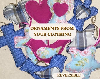 Peut inclure: Une collection d'ornements en tissu en forme de cœurs, d'étoiles, de croix et d'oiseaux, avec du tissu à carreaux bleus, à fleurs roses et magenta uni avec des coutures visibles. Le texte indique : ORNAMENTS FROM YOUR CLOTHING et REVERSIBLE.
