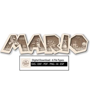 May include: A beige layered paper cutout of the word "MARIO" with scenes from the video game. Each letter features a different character or scene, including Mario, Bowser, and Princess Peach. The image includes the text "Digital Download - 6 File Types".