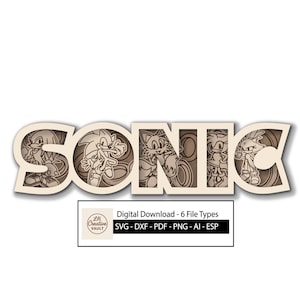 May include: A layered wooden sign spelling "SONIC" with character illustrations. The sign is beige with brown details, featuring Sonic, Tails, Knuckles, and Amy Rose. Includes a digital download graphic with file types.