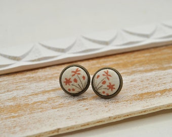 Ear plug. Material button dandelion