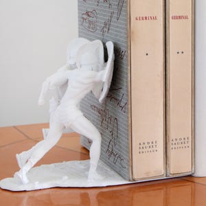 Serre-livres Art Déco singe avec lanterne par Max Le Verrier 1925 En