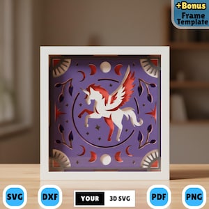 May include: A framed paper art piece depicting a white unicorn with red wings and details, set against a purple backdrop with crescent moons and stars. The artwork is in a white square frame and includes the text "YOUR 3D SVG".